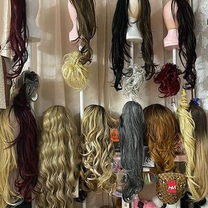 Ponytail hair synt $35 27”long. Wigs synt $60